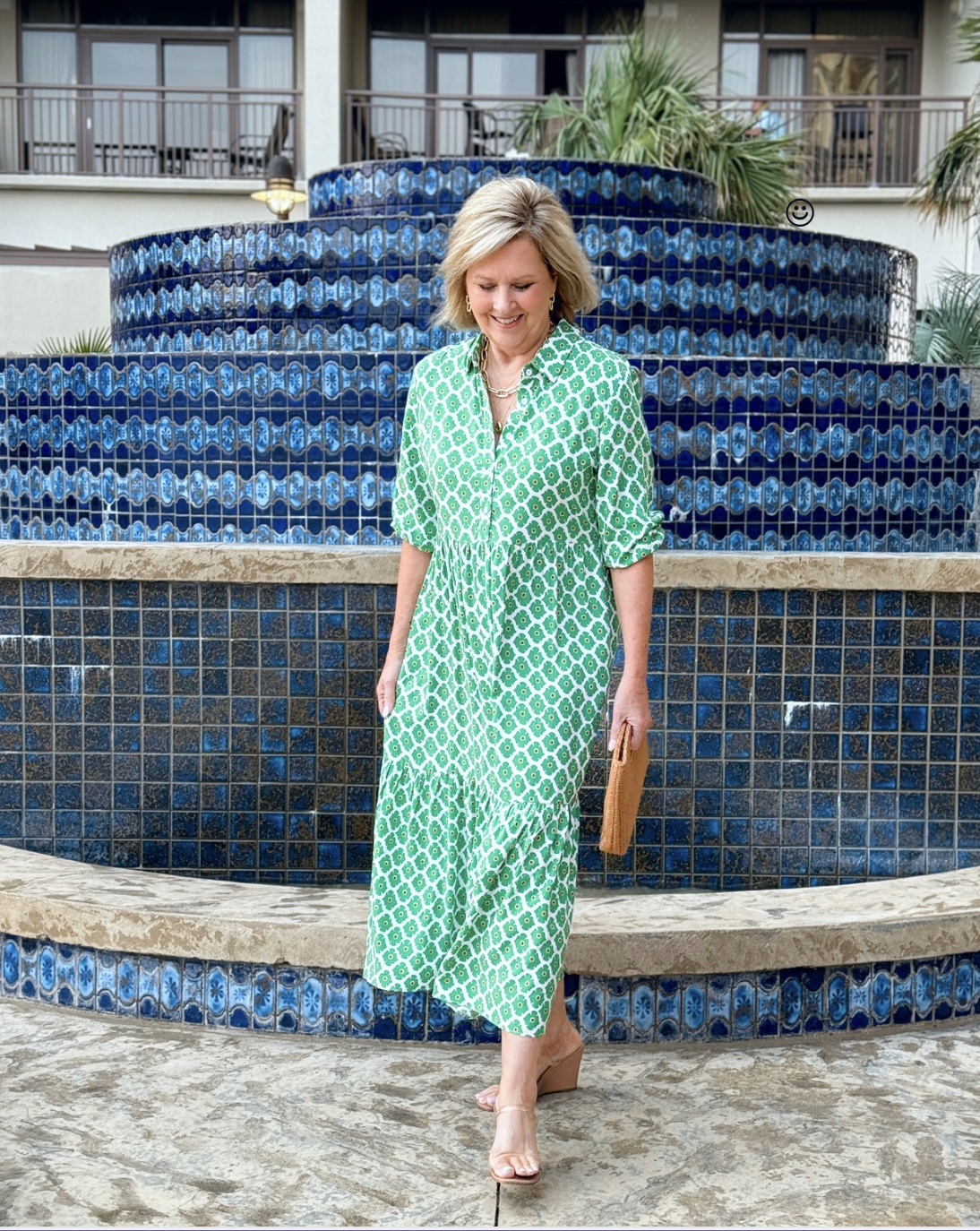 woman over 50 wearing a colorful green dress from Amazon for summer